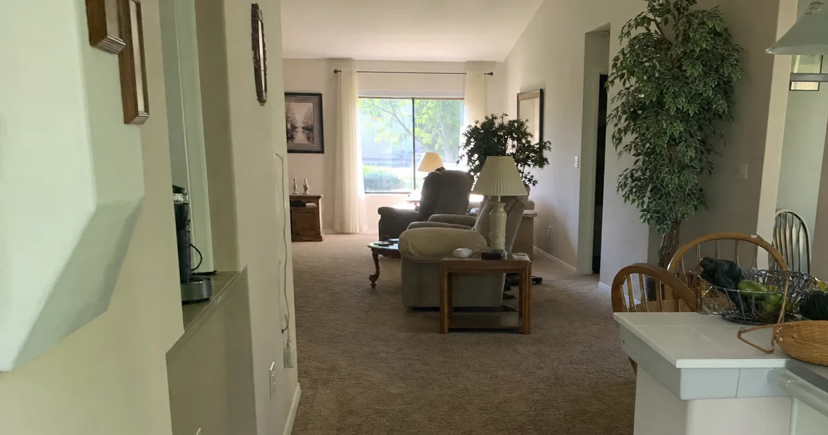 Van Nuys, CA: a residential carpeted room